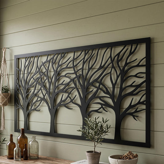 Framed Tree Branches Metal Wall Art styled on a living room wall