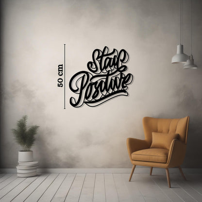 Stay Positive Metal Wall Art styled above a sofa
