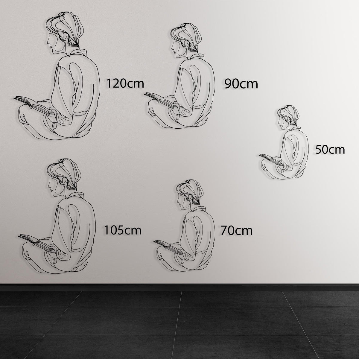 Reading Woman Metal Wall Art in a modern hallway