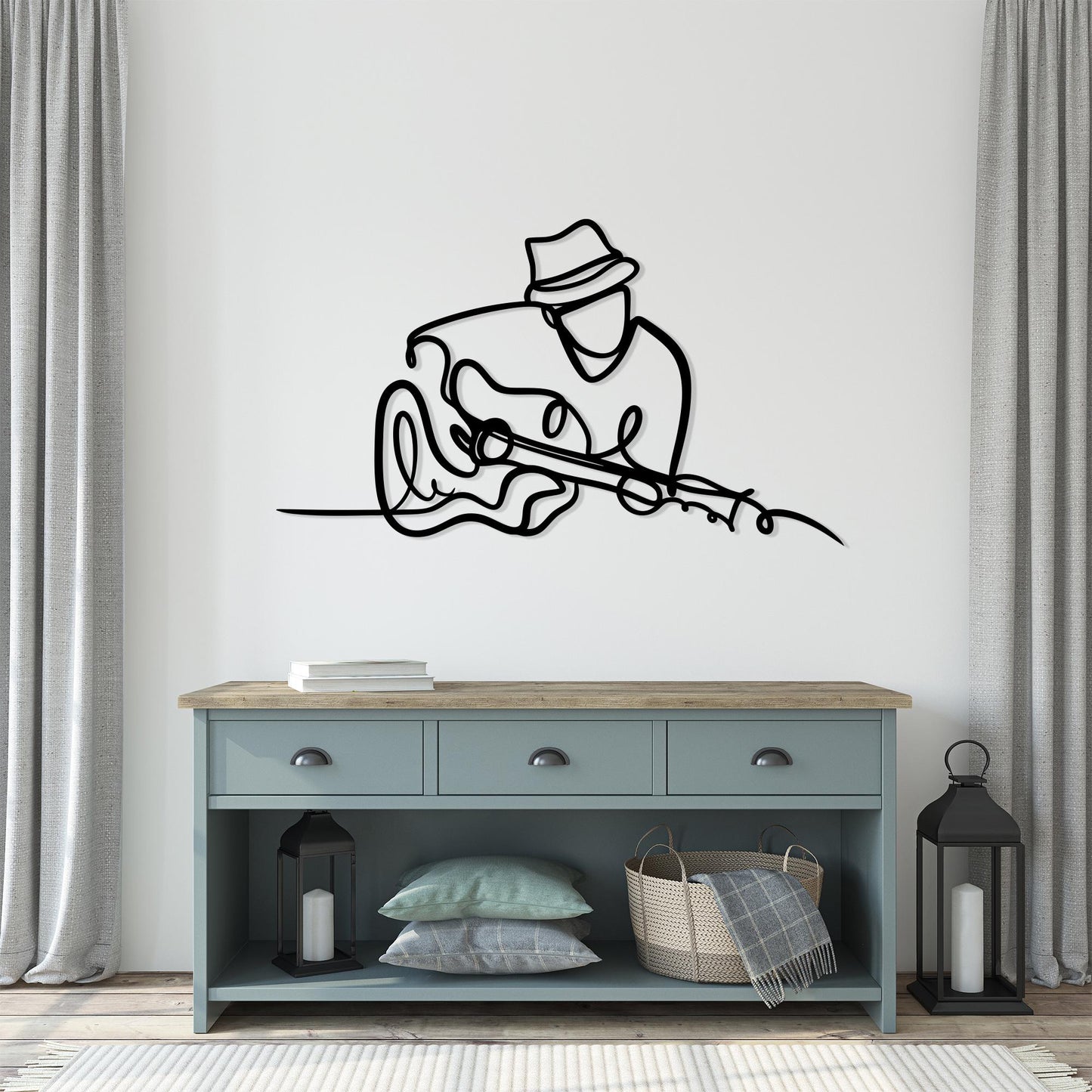 Guitarist Metal Wall Art styled above a sofa
