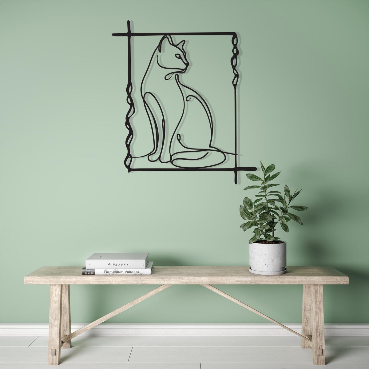 Minimalist Cat Line Art styled above a sofa