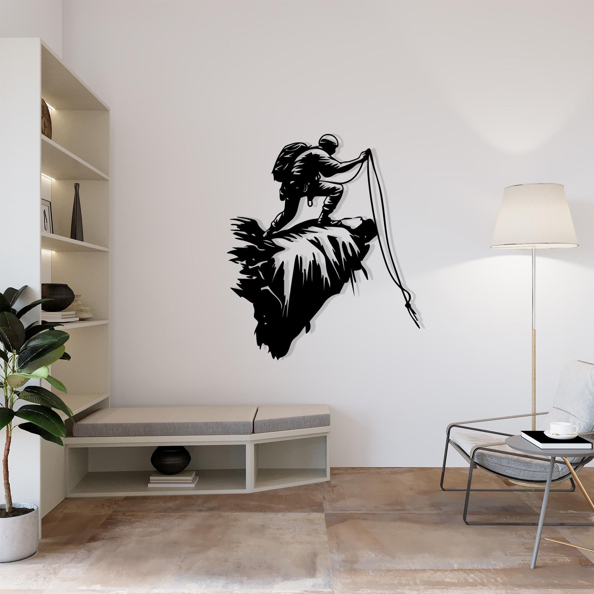 Rock Climber Metal Wall Art styled above a sofa