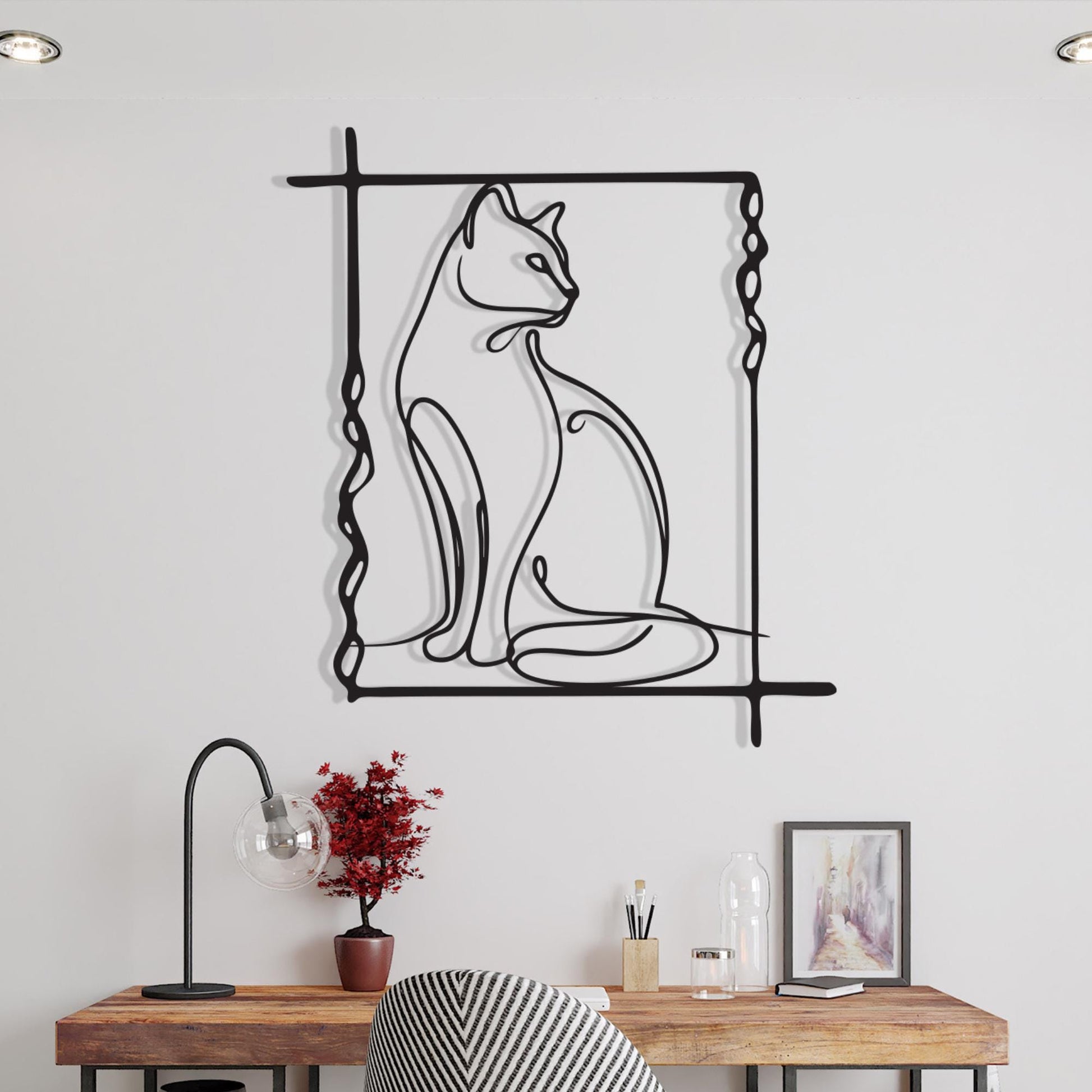 Minimalist Cat Line Art shown on a living room wall
