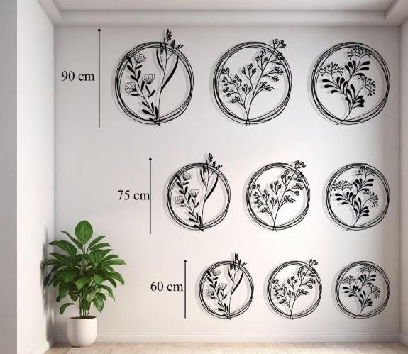 Set of 3 Metal Botanical Flower Wall Art in a modern hallway