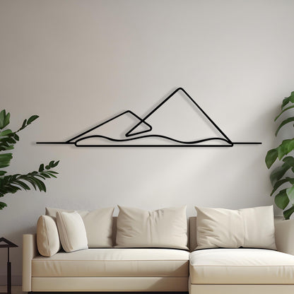 Minimalist Mountain Metal Wall Art shown on a living room wall