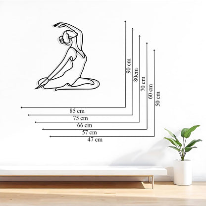 Yoga Pose Metal Wall Art styled above a sofa