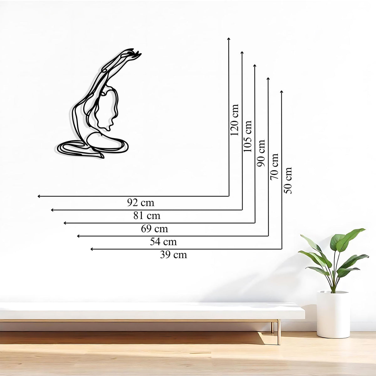 Minimalist Yoga Pose Metal Wall Art styled above a sofa