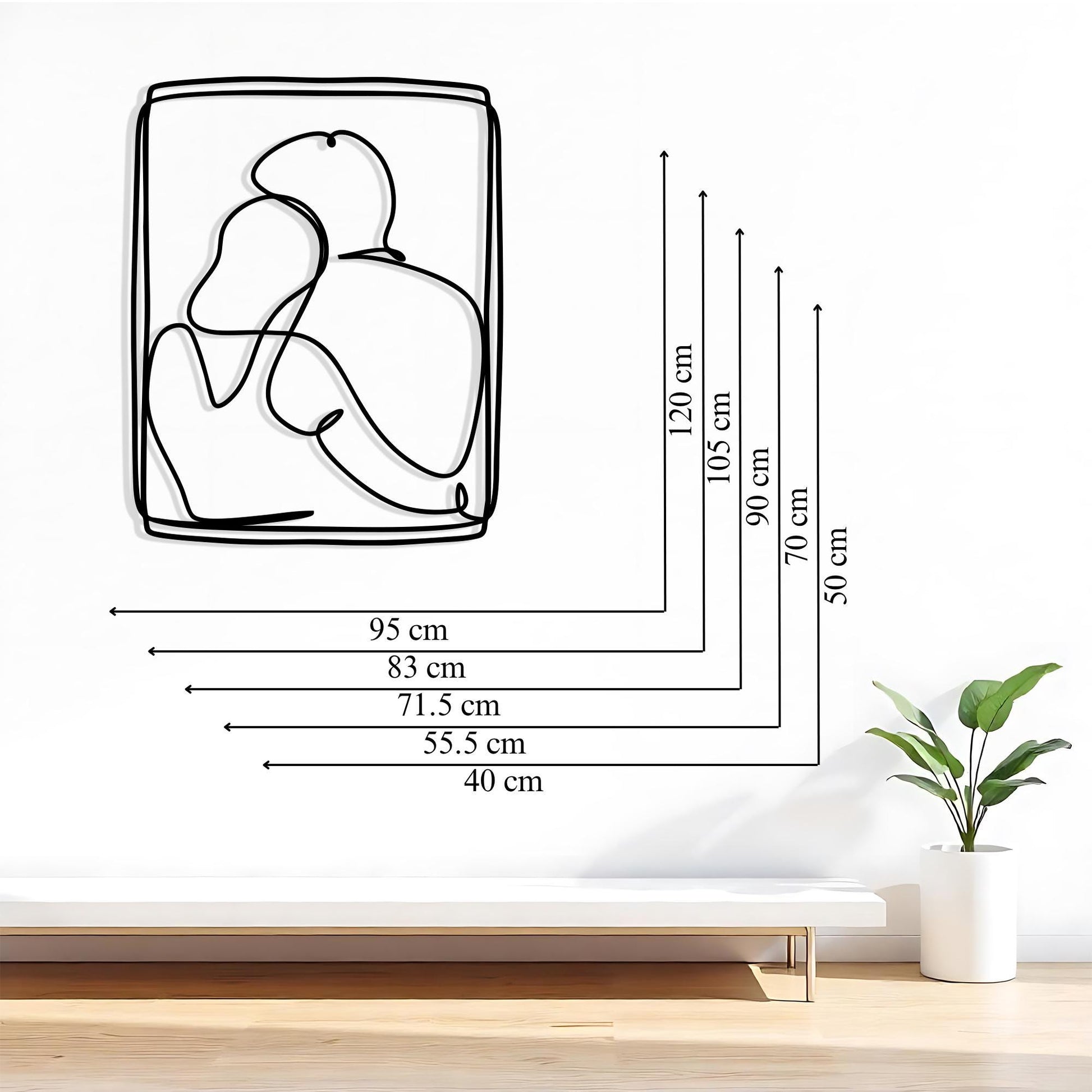 Couple Metal Wall Art styled above a sofa