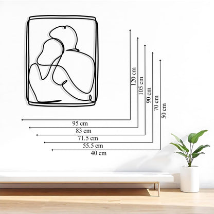 Couple Metal Wall Art styled above a sofa