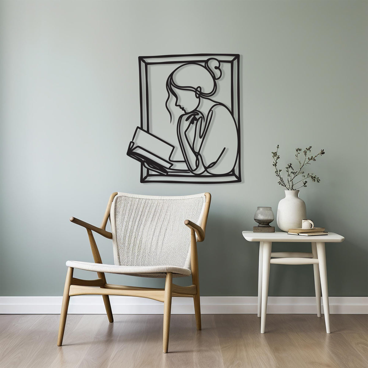 Woman Reading Metal Wall Art close-up of the powder-coated finish