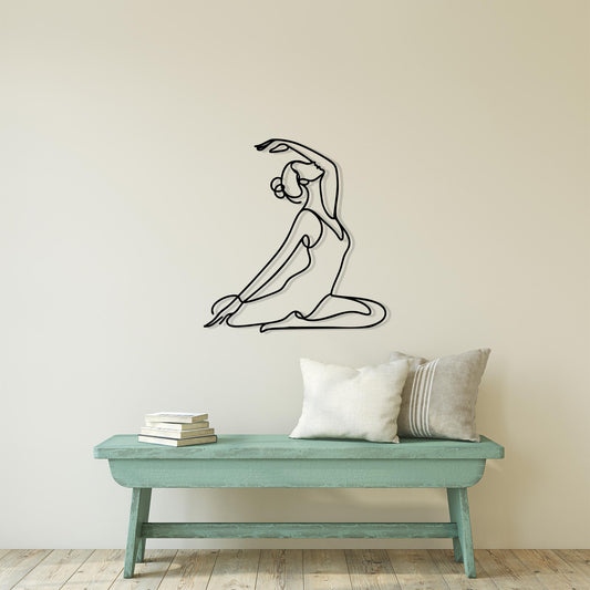 Yoga Pose Metal Wall Art shown on a living room wall