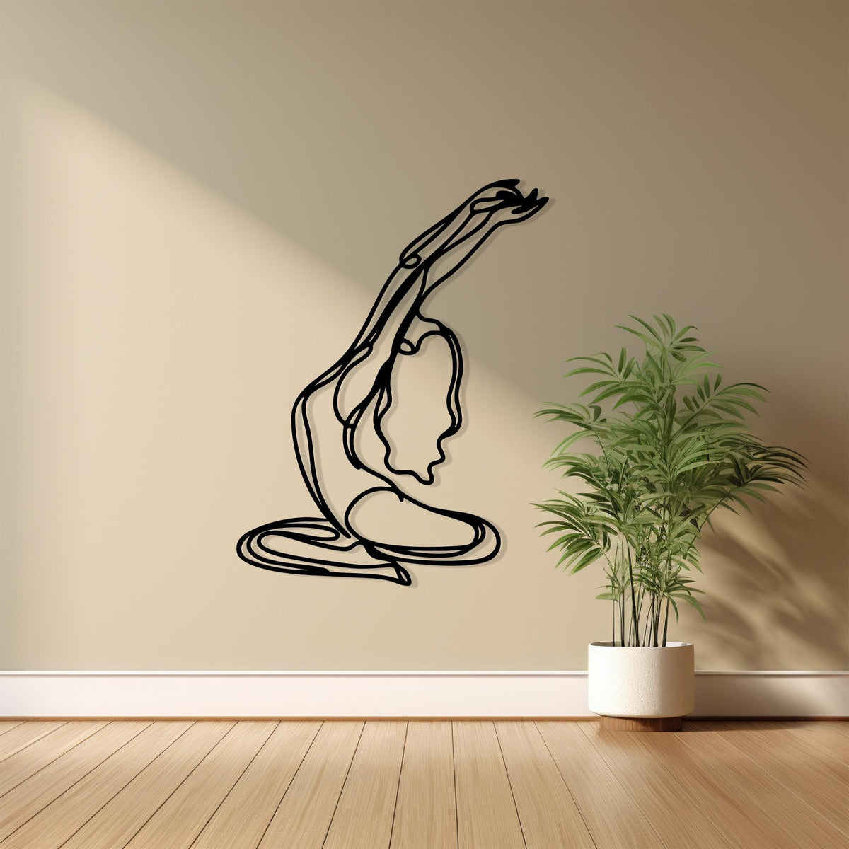 Minimalist Yoga Pose Metal Wall Art shown on a living room wall
