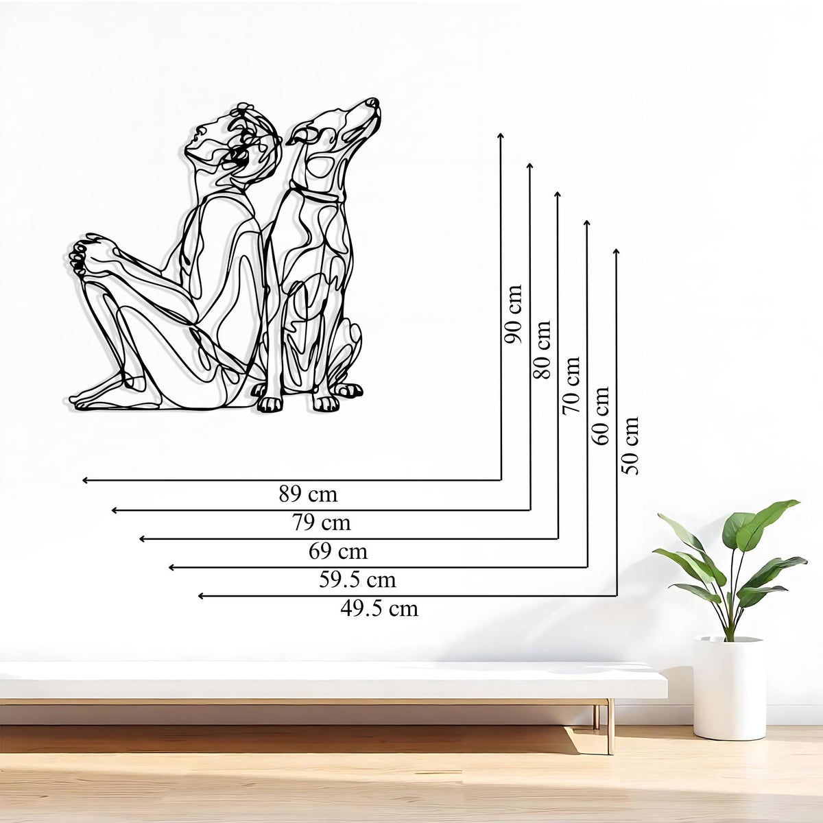 Modern Line Art Dog and Owner Metal Wall Decor styled above a sofa