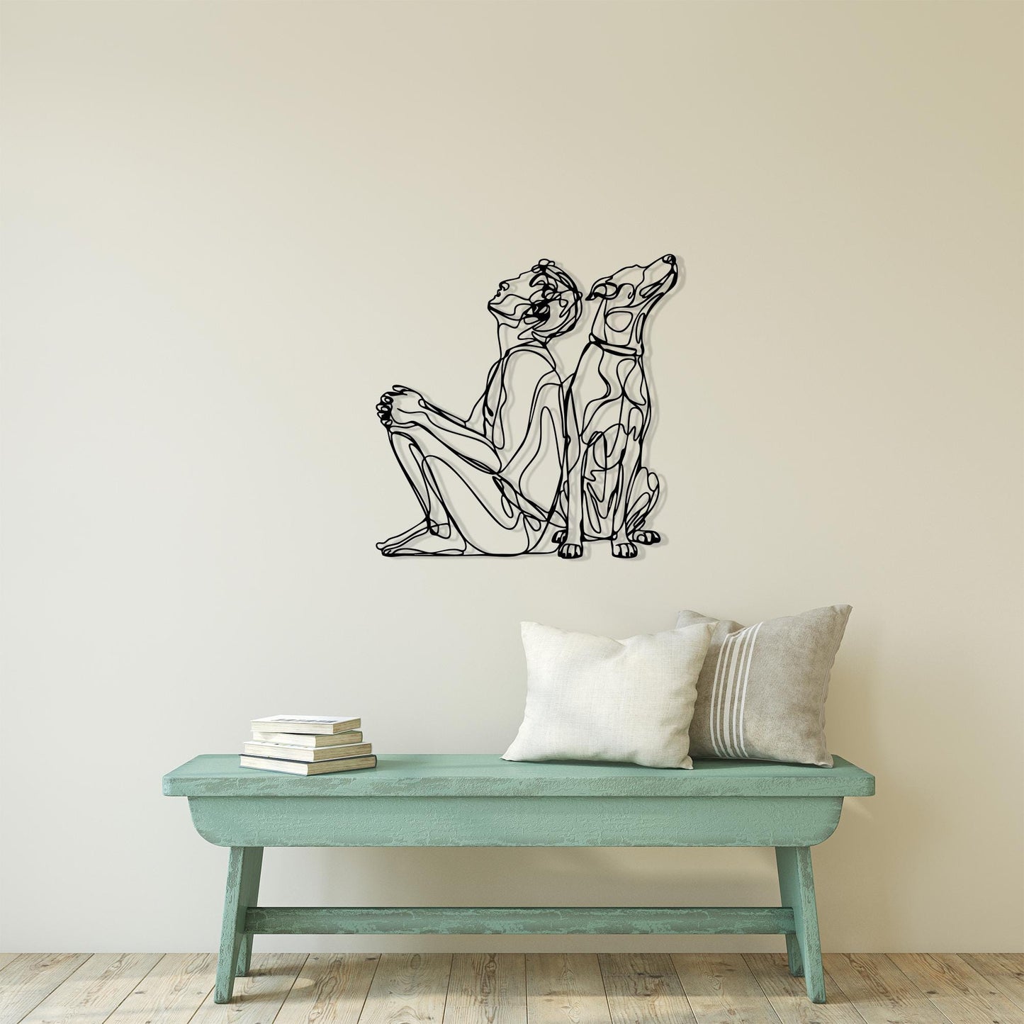 Modern Line Art Dog and Owner Metal Wall Decor shown on a living room wall