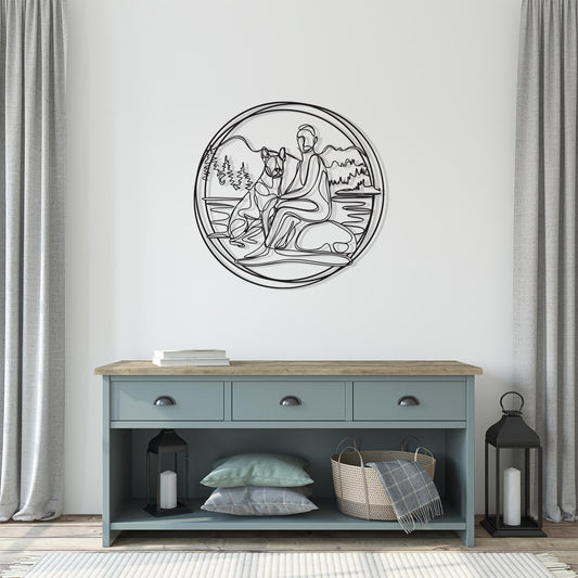 Minimalist Dog and Owner Metal Wall Art shown on a living room wall