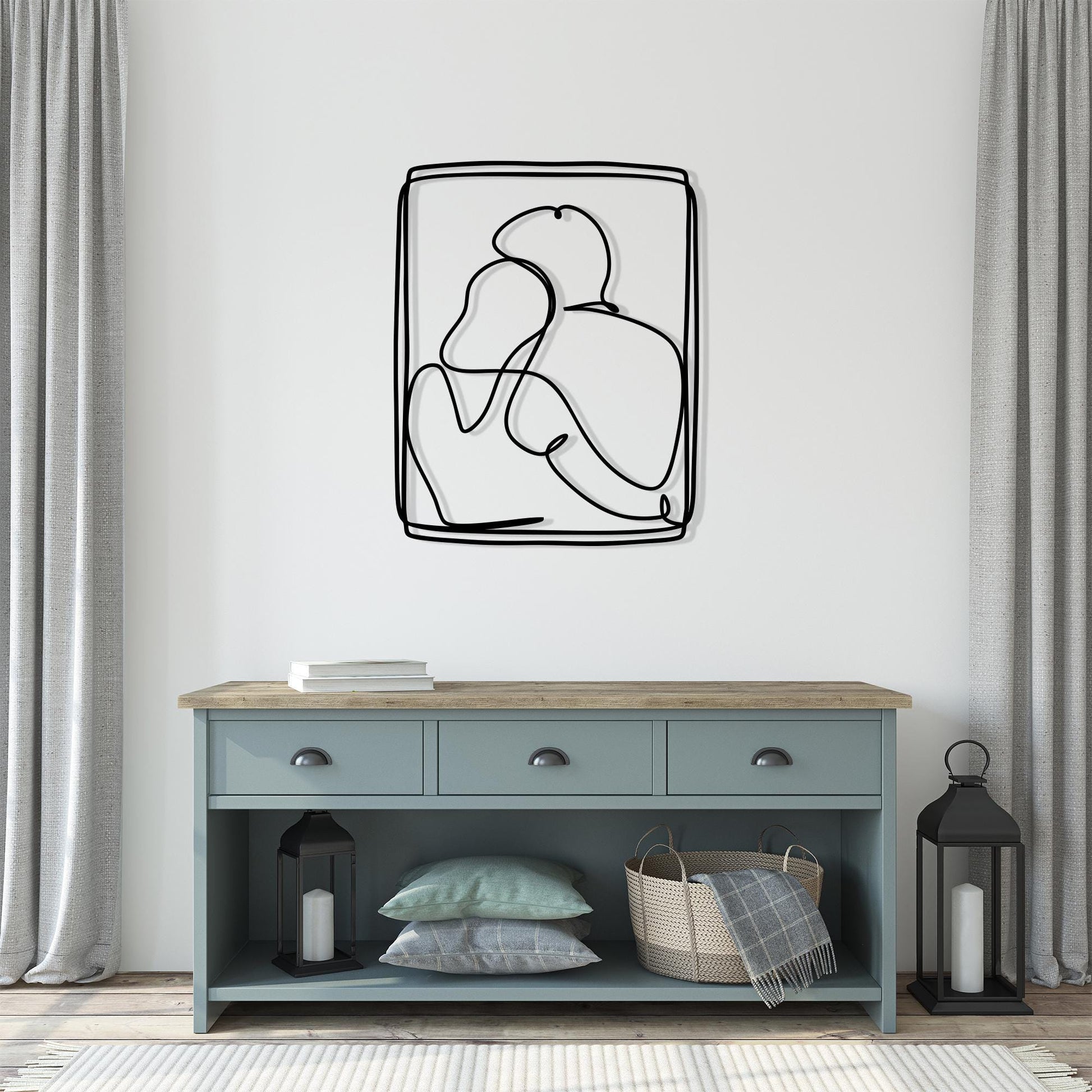 Couple Metal Wall Art shown on a living room wall
