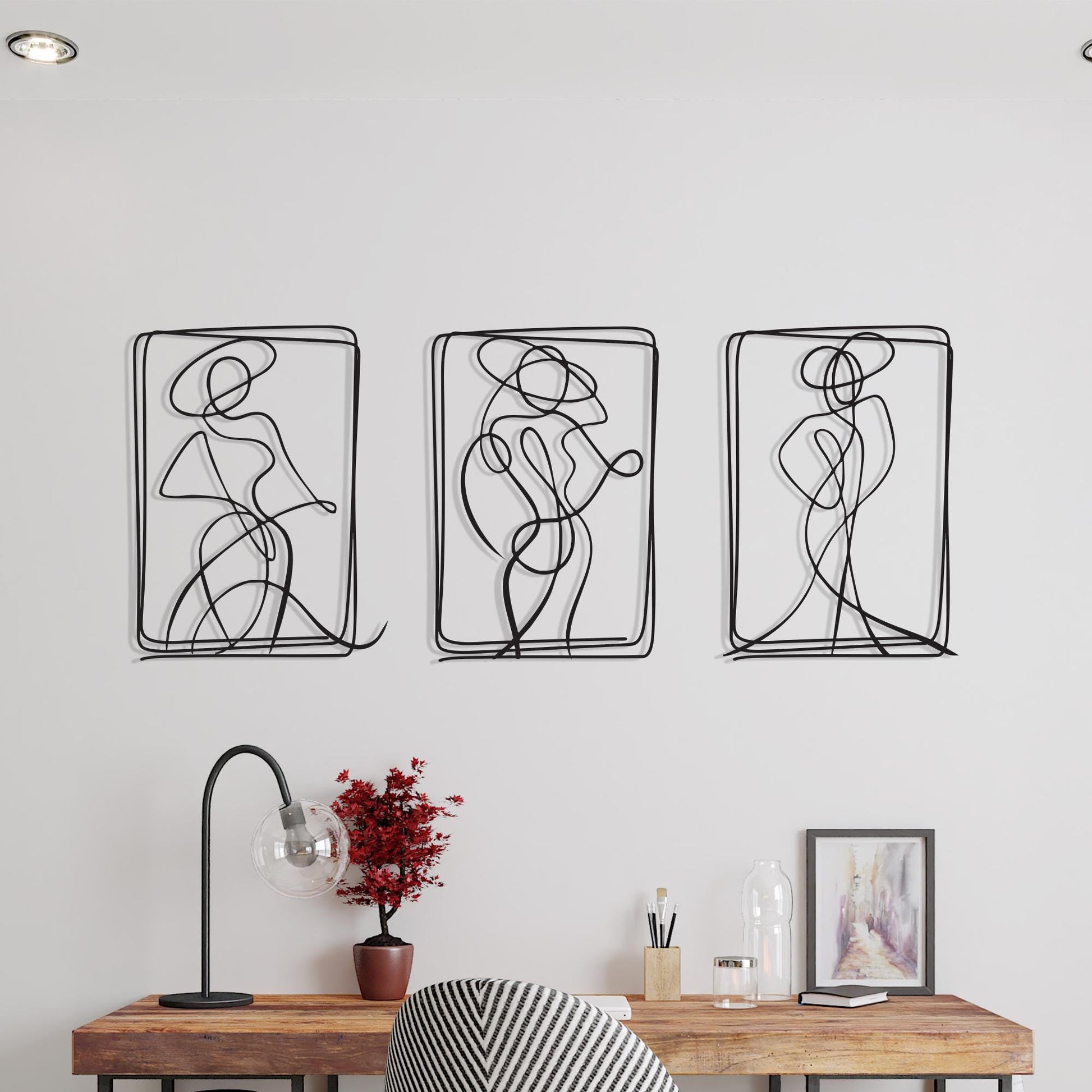 Set of 3 Metal Wall Art in a modern hallway