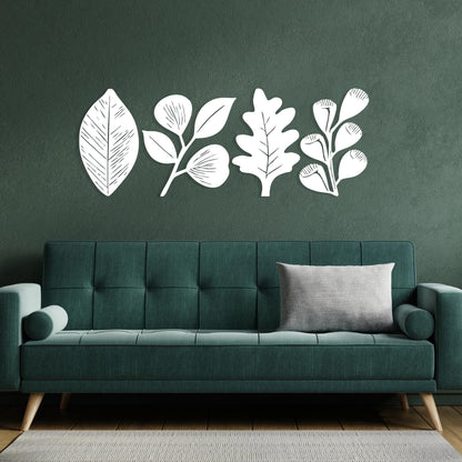Minimalist Metal Leaf Wall Art Set of 4 styled above a sofa