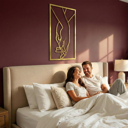 Minimalist Metal Hands Wall Art shown on a living room wall