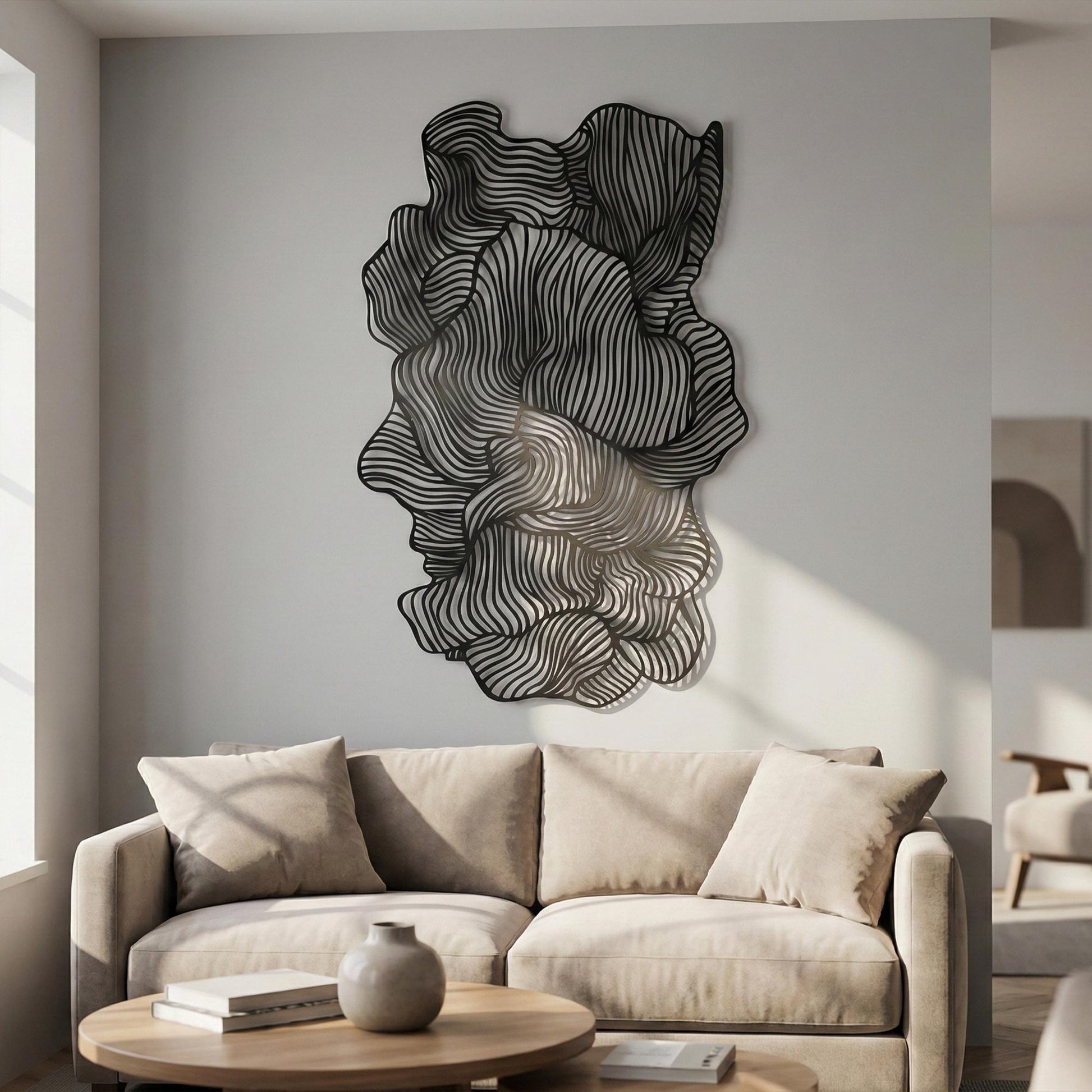 Black Metal Wall Art styled above a sofa