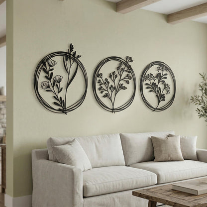 Set of 3 Metal Botanical Flower Wall Art styled above a sofa