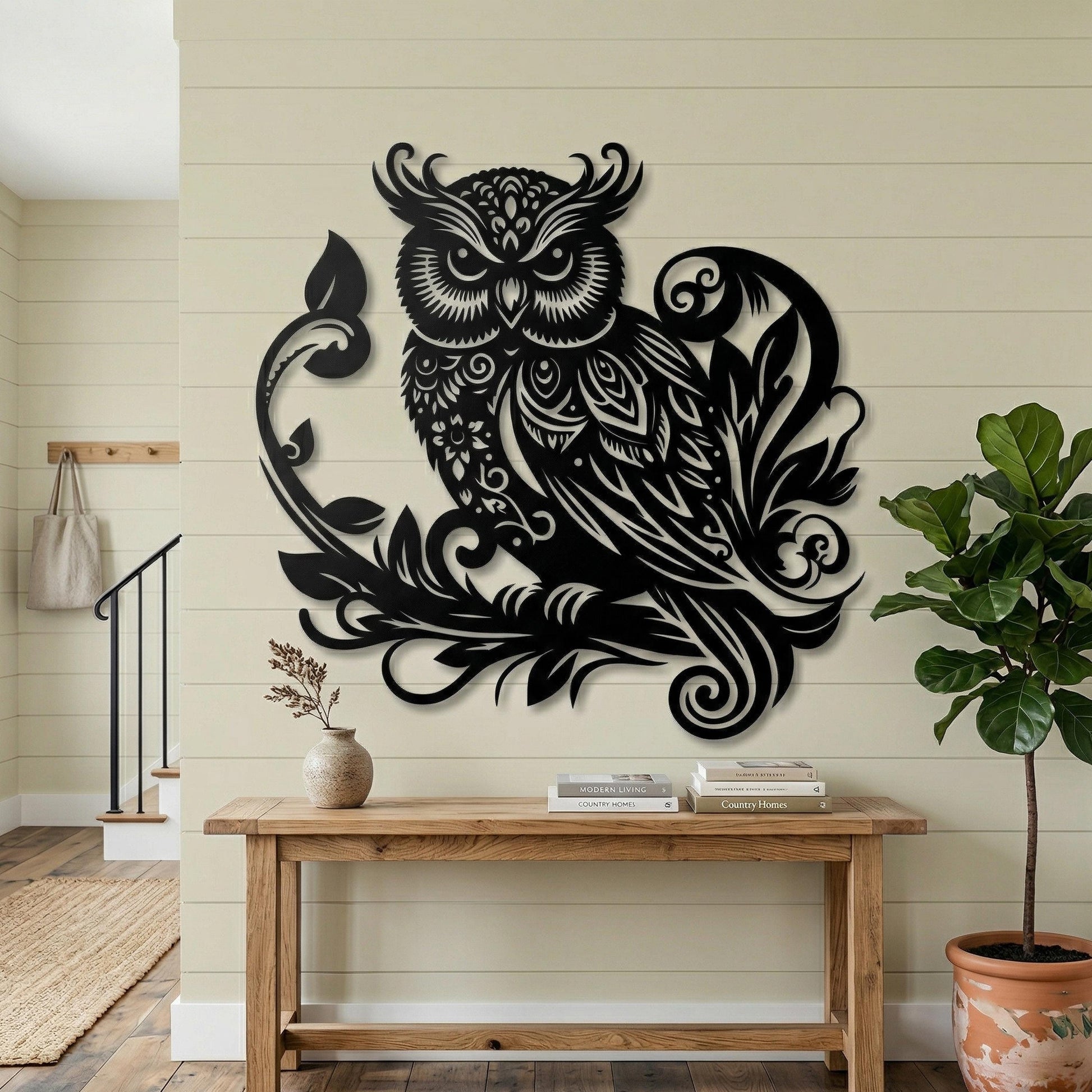 Black Metal Owl Wall Art shown on a living room wall