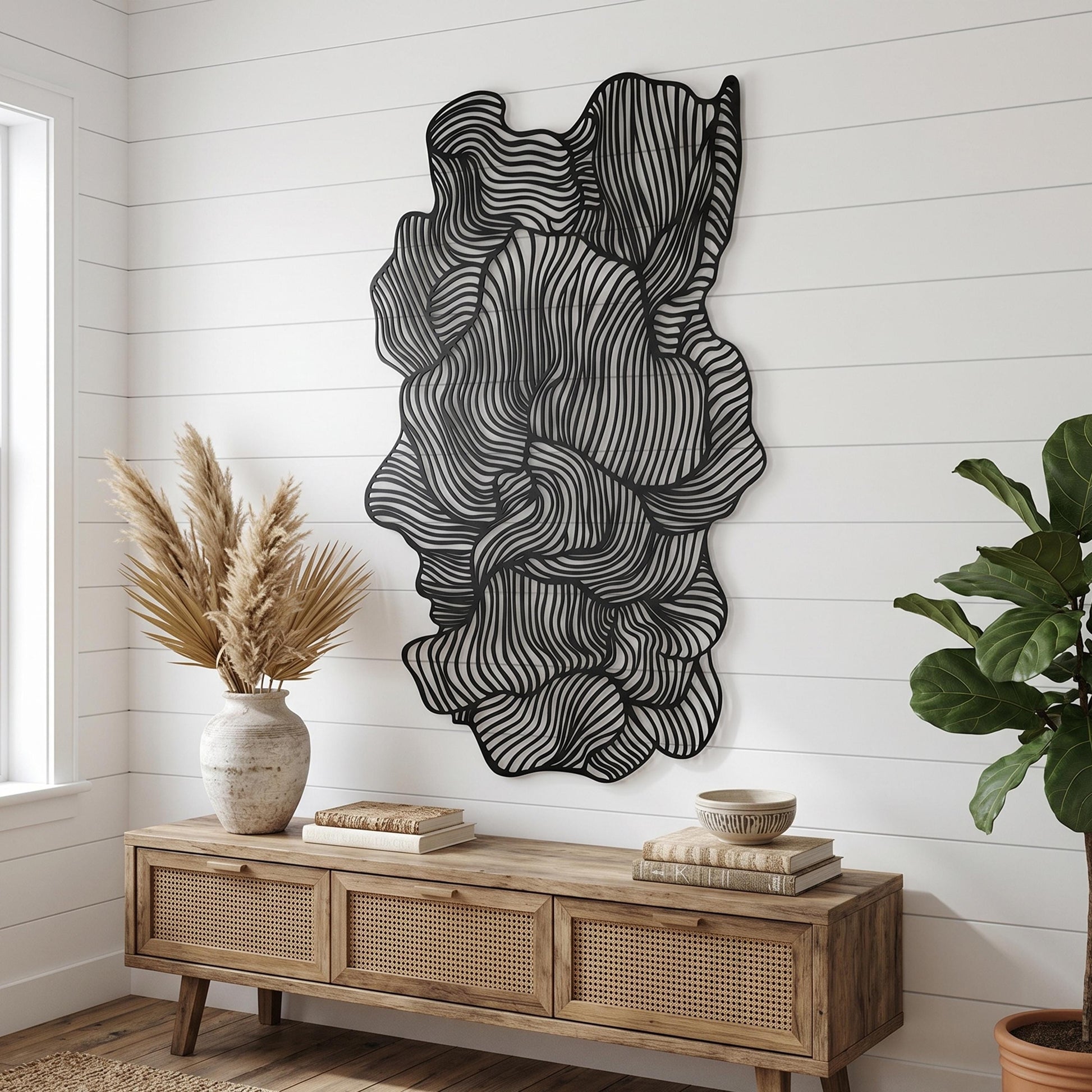 Black Metal Wall Art shown on a living room wall