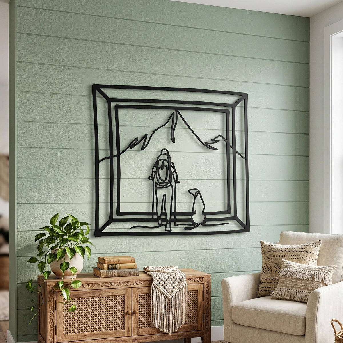 Hiker and Dog Metal Wall Art shown on a living room wall