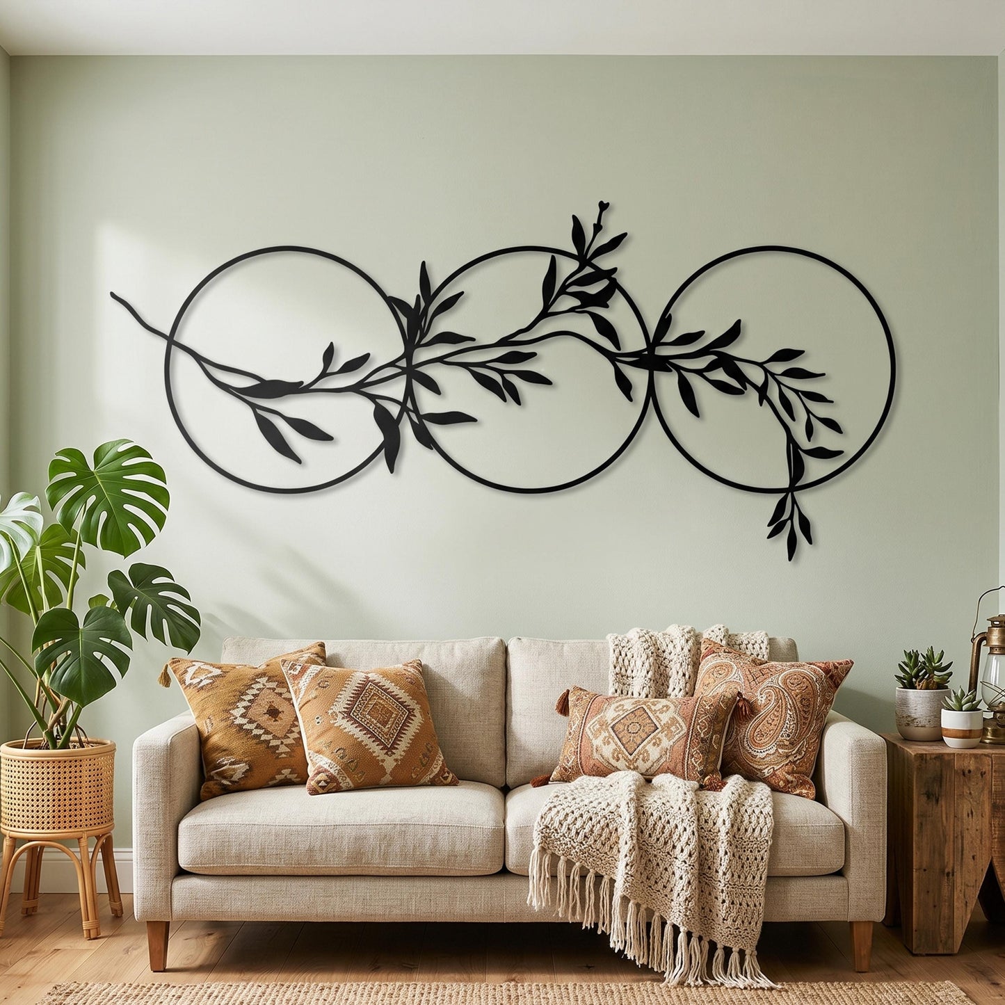 Olive Branch Circles Matte Black Steel Botanical Over Bed Horizontal Art close-up of the powder-coated finish