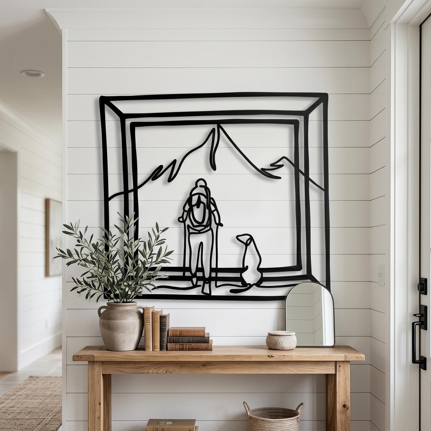Hiker and Dog Metal Wall Art in a modern hallway
