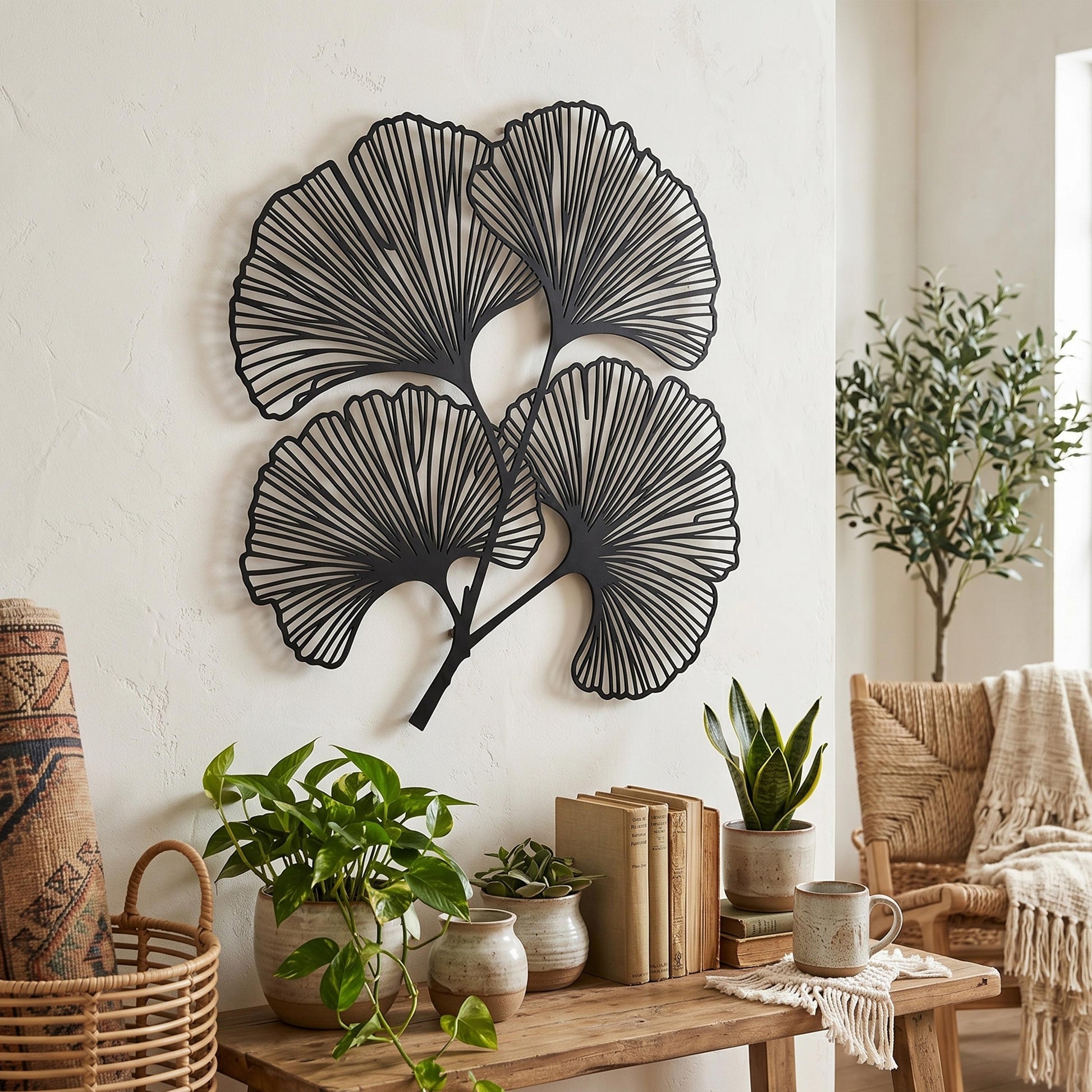 Ginkgo Leaf Metal Wall Art styled on a living room wall