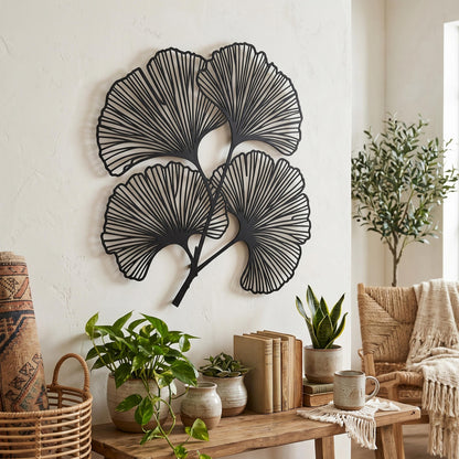 Ginkgo Leaf Metal Wall Art styled on a living room wall
