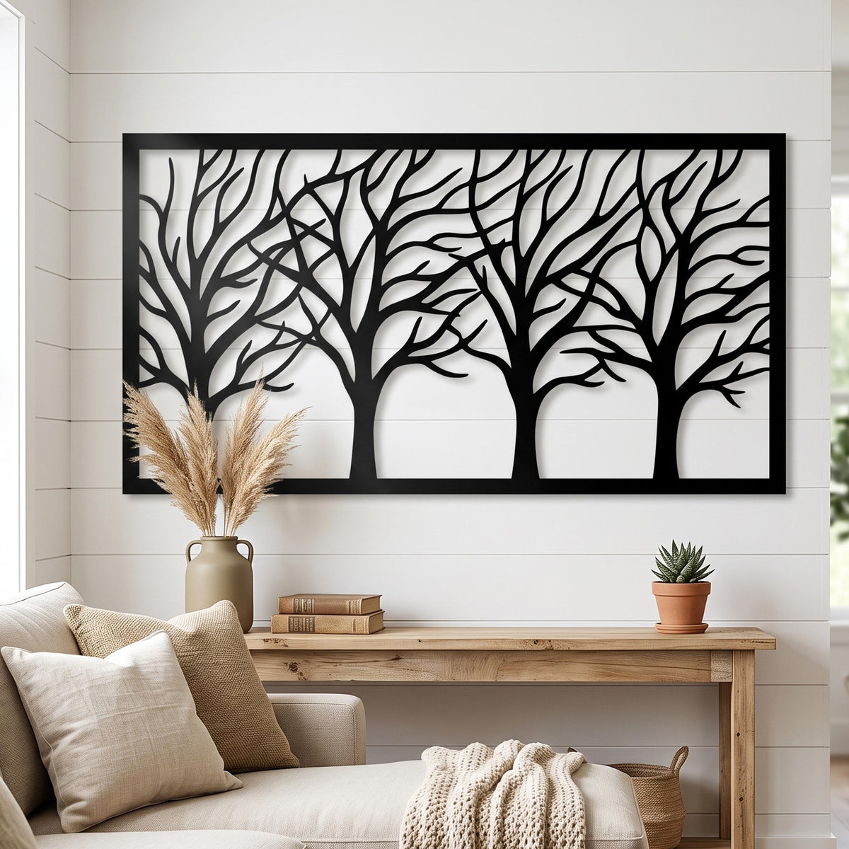 Framed Tree Branches Metal Wall Art styled above a sofa