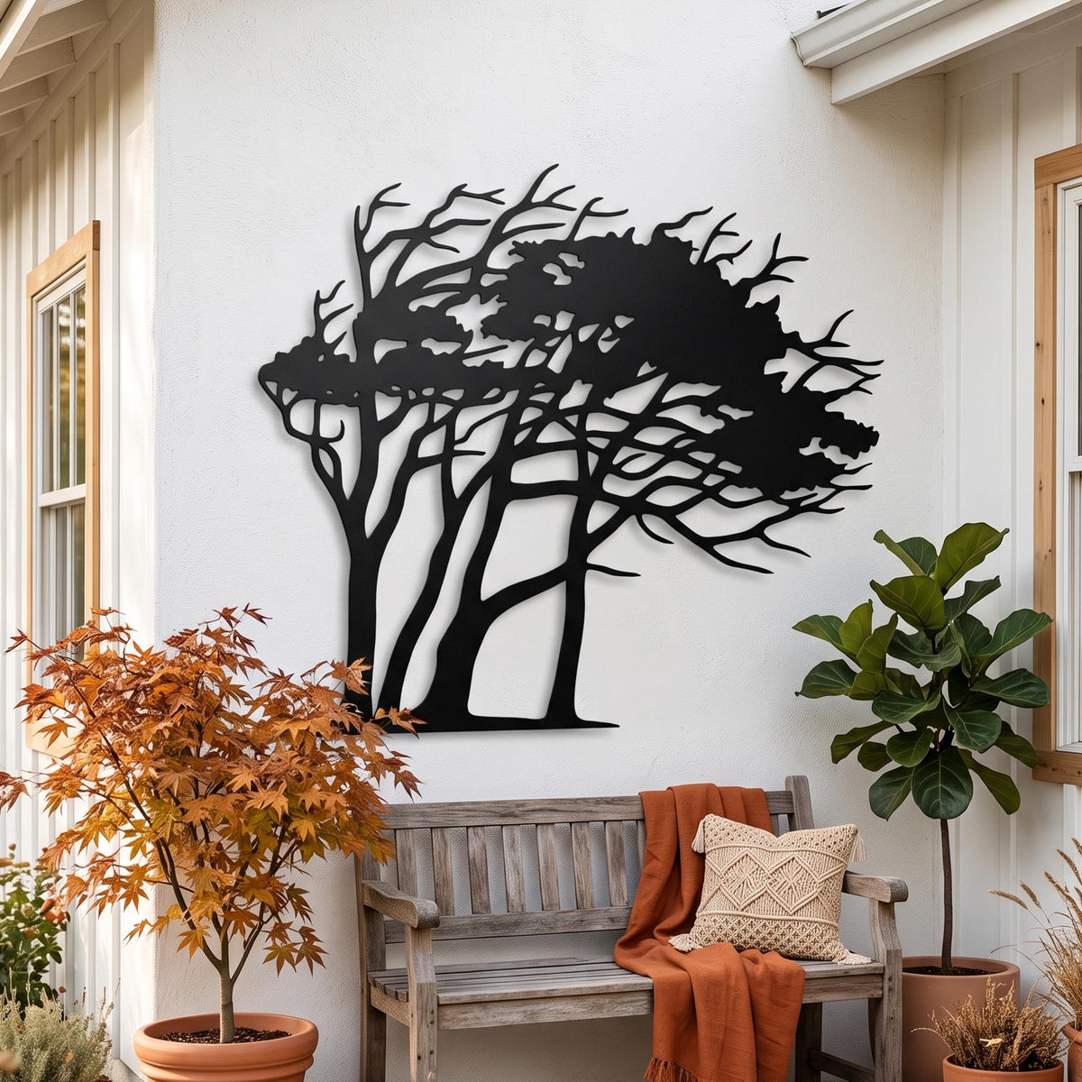 Windswept Tree Metal Wall Art styled on a living room wall