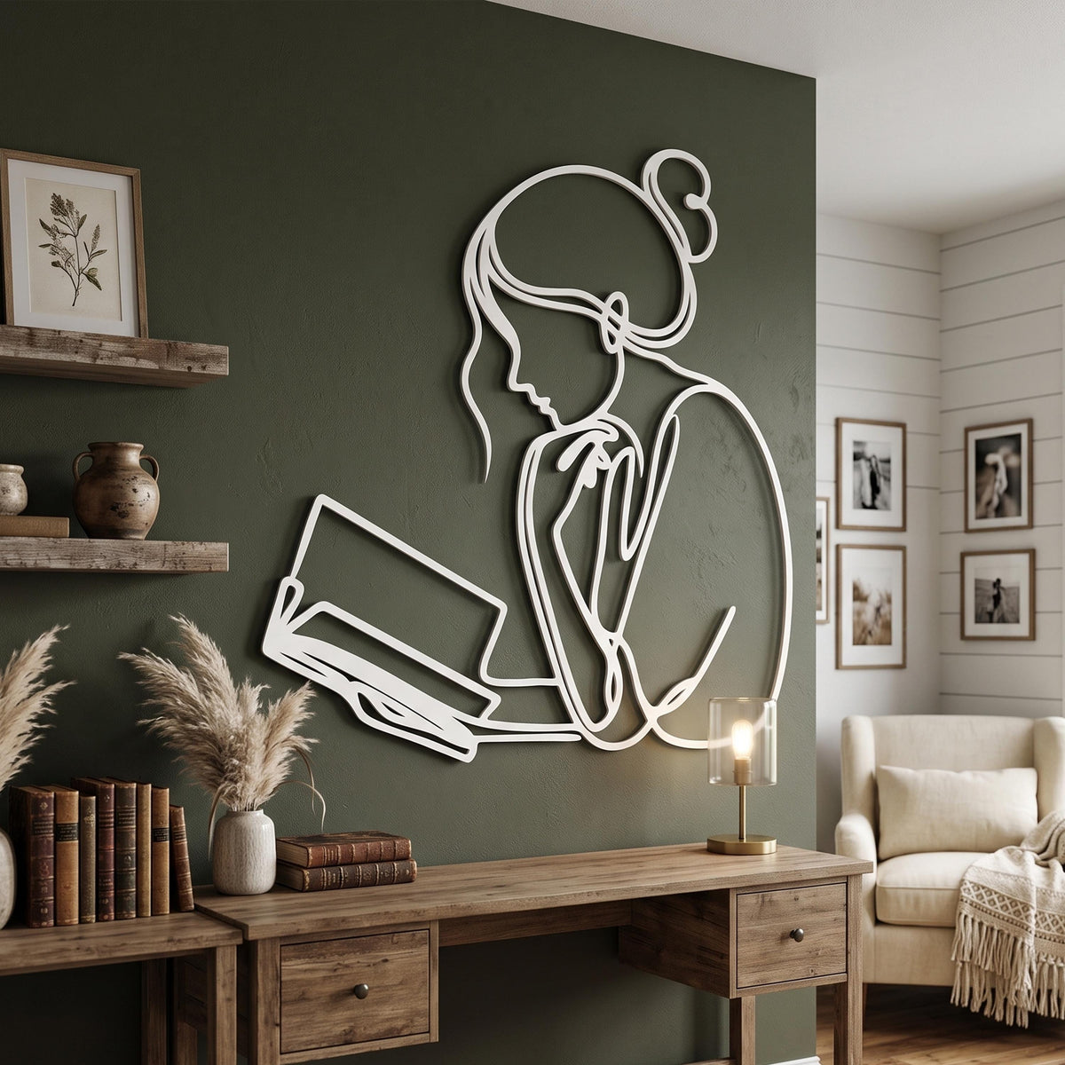 Minimalist Reading Woman Metal Wall Art shown on a living room wall