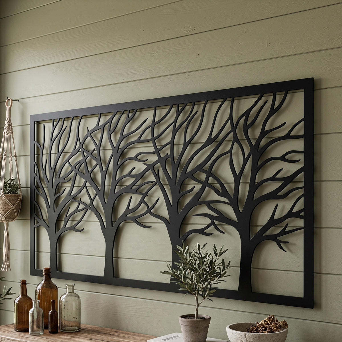 Framed Tree Branches Metal Wall Art styled on a living room wall